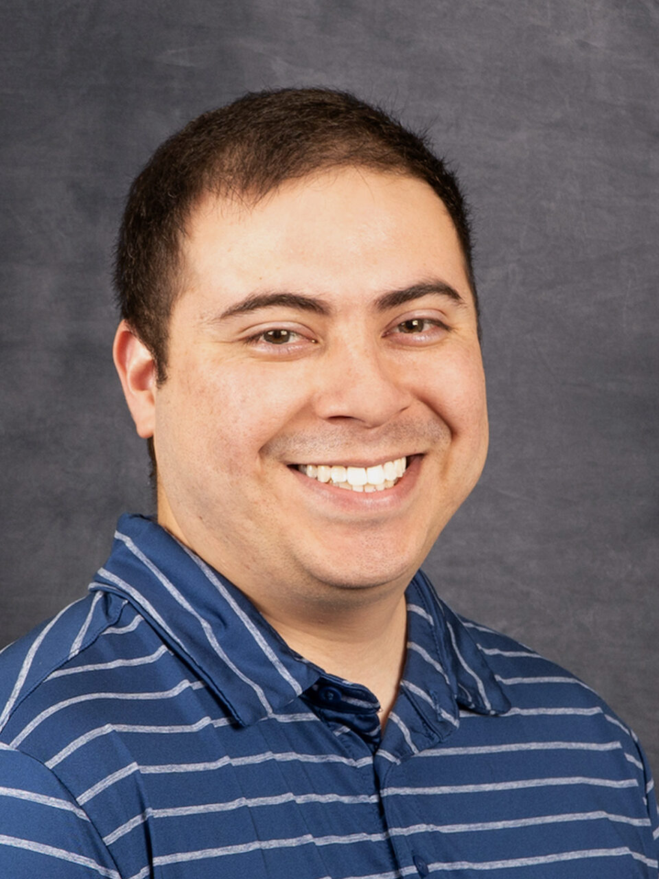 Andrew Encinas, visiting assistant professor of chemistry and biochemistry