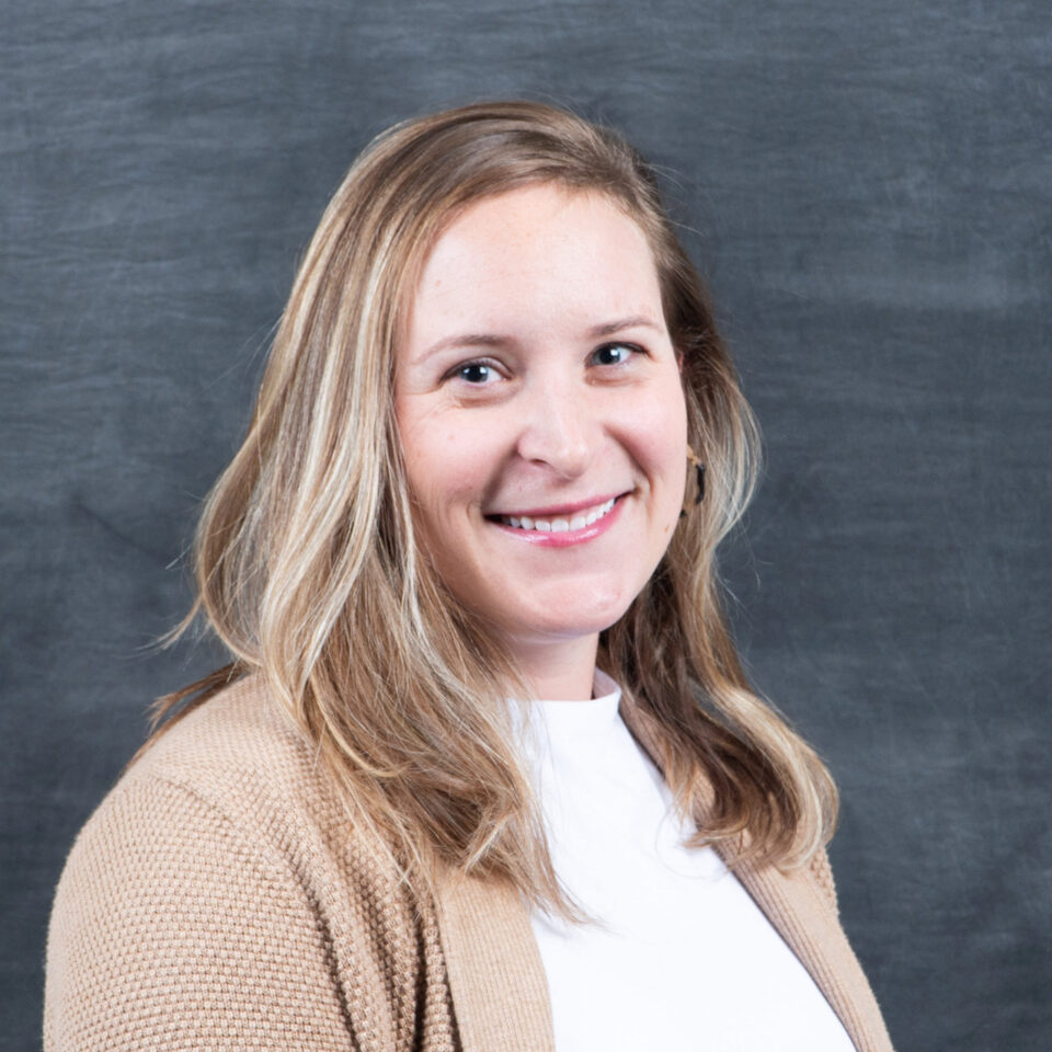 headshot Sarah Cassella, Neuroscience professor smiling