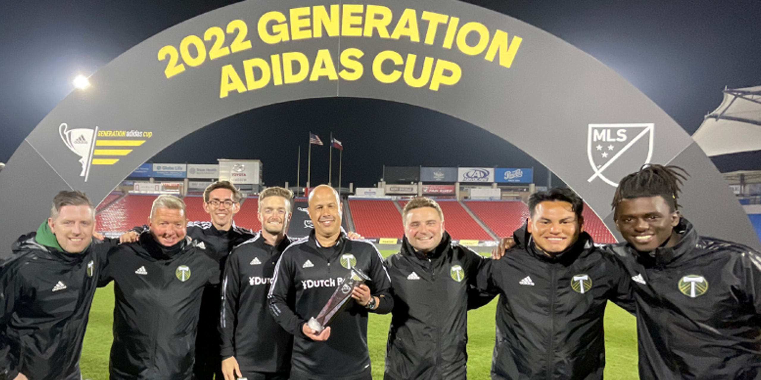 Loras students posing at the 2022 Generation Adidas Cup race.