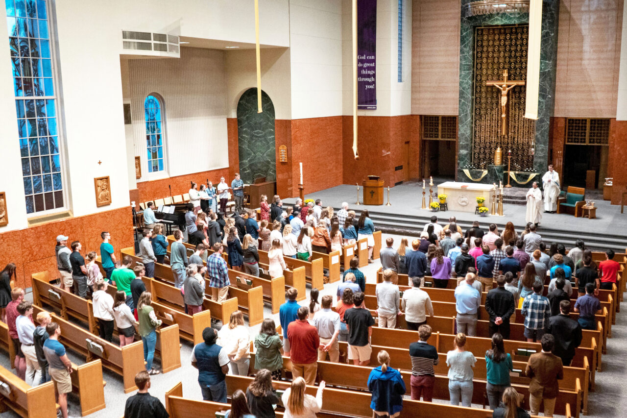 Many student, faculty families and friends at Sunday Mass in Christ the King Chapel