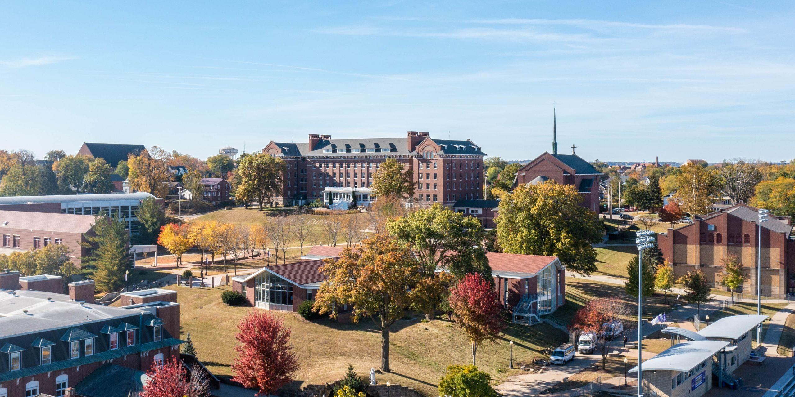 Brick buildings with fall foliage on trees