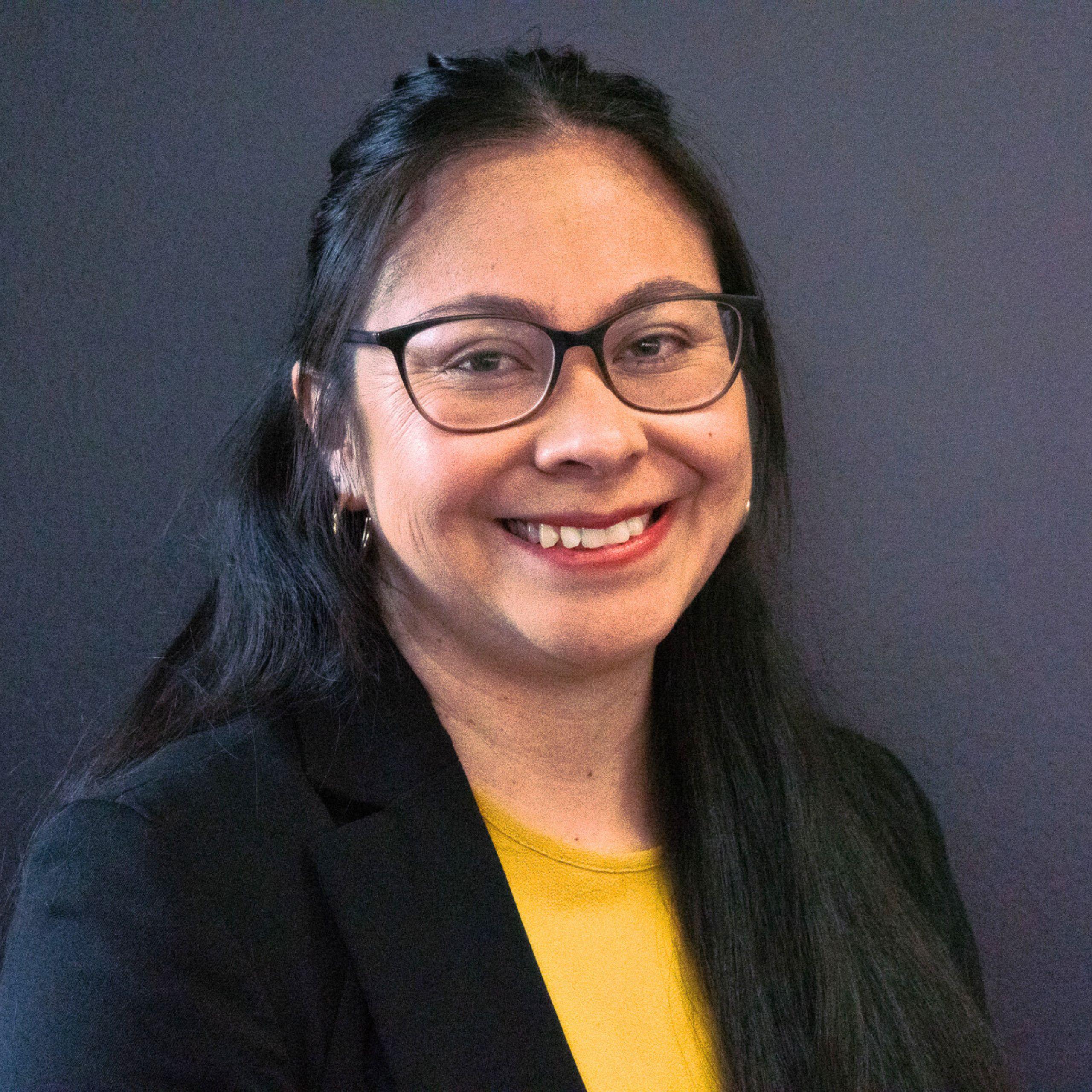 Headshot of Marie Maguina Heller