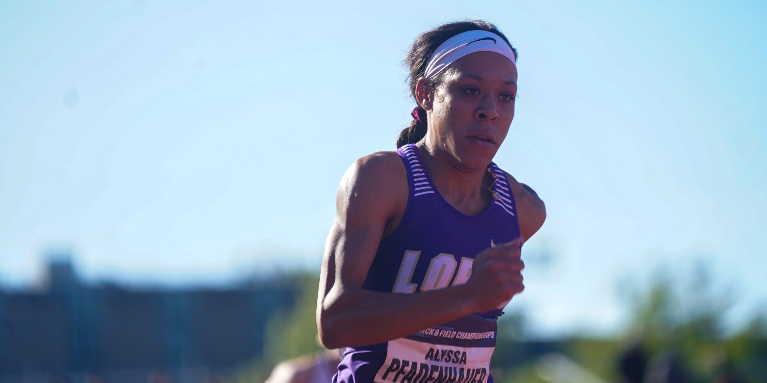 Loras College Track and Field student running