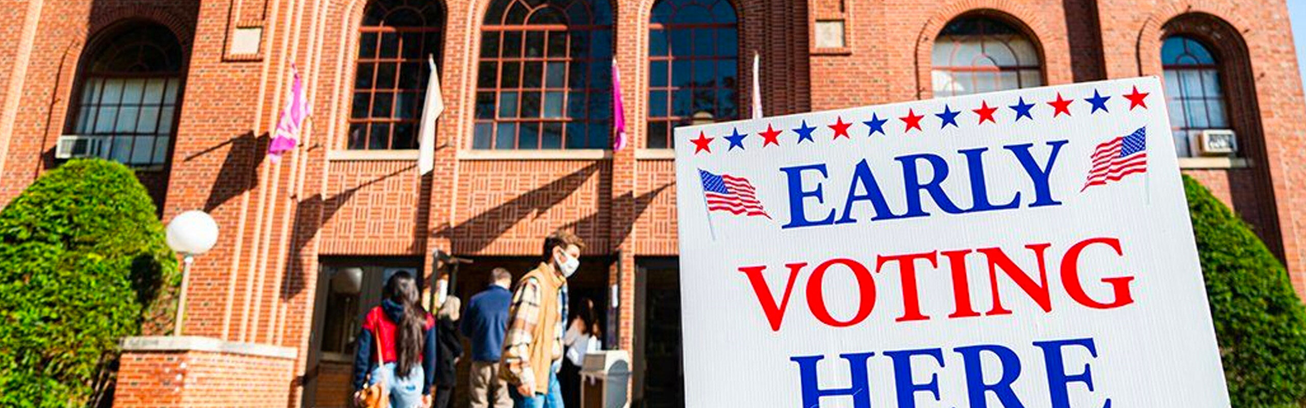 Vote Early sign posted by Politics students