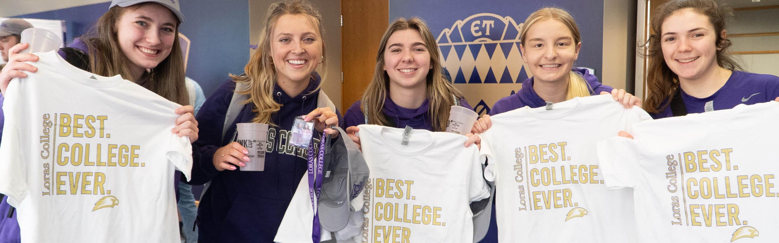 three Loras women students with matching Duhawk Day t-shirts