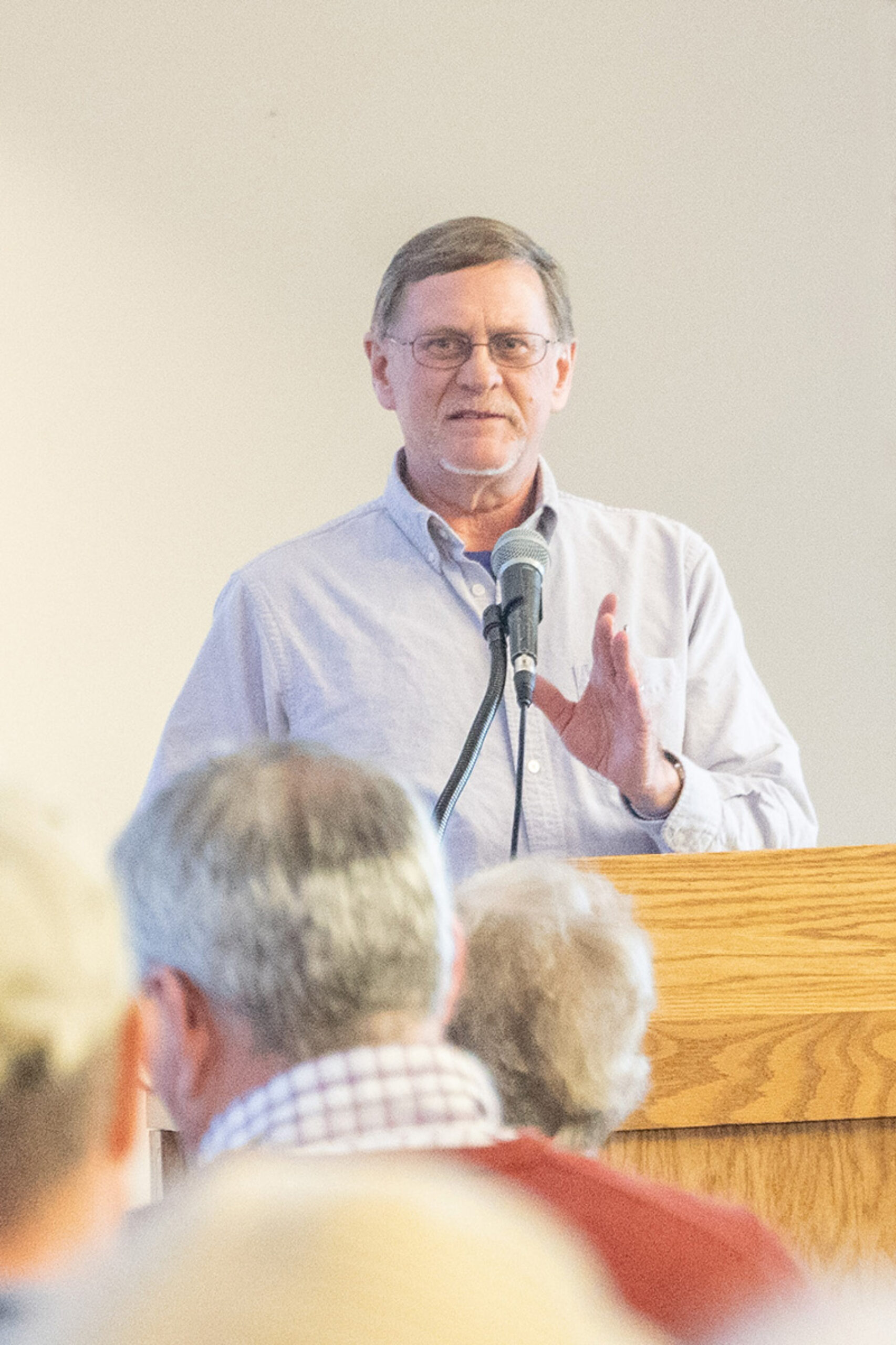 Professor Kevin Koch presenting his book on Loras College campus